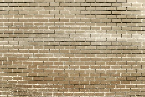 Old beige brick wall background — ストック写真