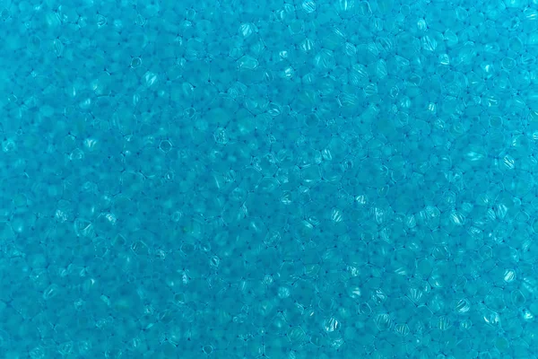 Macro sponge texture, blue bubbles. — Stock Photo, Image