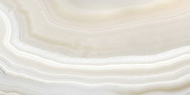 Dekoratif Onyx yüzeyi. Arkaplan ve Tasarım için doku, Açık oniks yüzey, Aydınlık taş yüzey, Arkaplan ve Tasarım için Mermer Doku, Soyut renkli mermer, İtalyan mermer arka plan deseni ve dokusu, mermer fotoğrafçılık