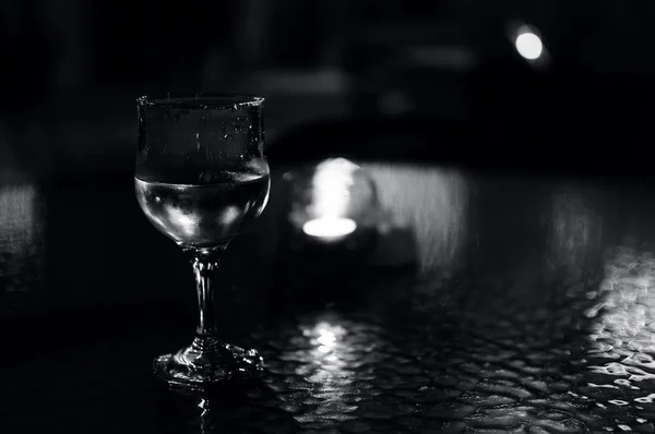 A glass of cold water on the table — Stock Photo, Image