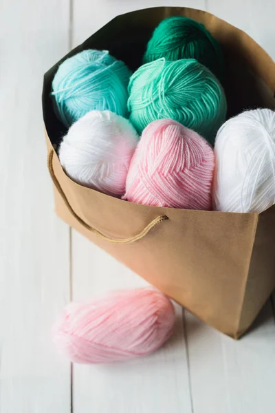 Oval acrylic wool yarn thread skeins with kraft package — Stock Photo, Image