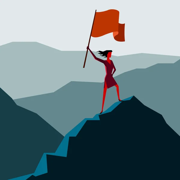 Kadın bir dağ tepe üzerinde bayrak ile
