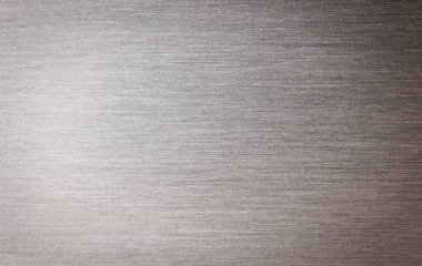 Metal doku arka planı. Fırçalanmış alüminyumun makro fotoğrafı