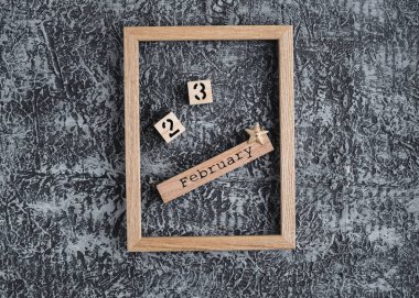 23 Şubat Tatil geçmişi. gebelik Uluslararası Erkekler Günü ve Anavatan Savunma Günü 23 Şubat 'ta tebrik kartı. en üstteki görünüm