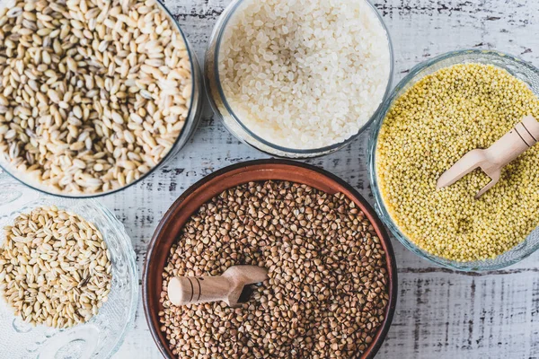 Different types of gluten-free cereals: millet, rice, buckwheat