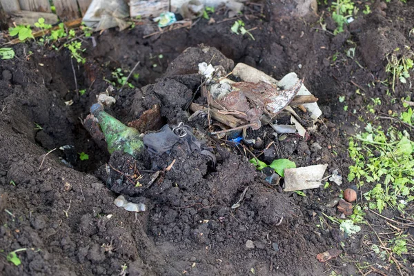 outdoor rubbish, plastic bottles and other non-degradable rubbish on the ground