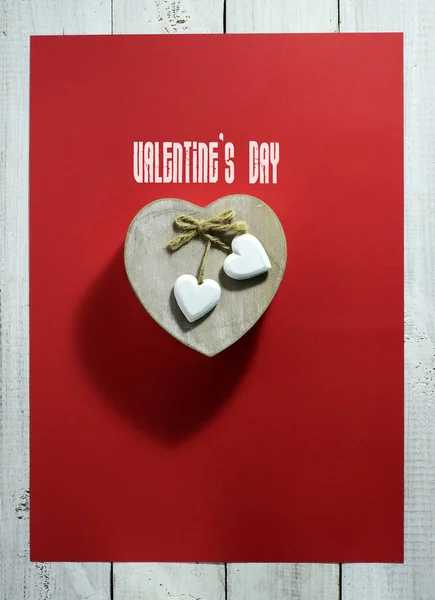 Valentine's Day card with hearts on a red background — Stock Photo, Image