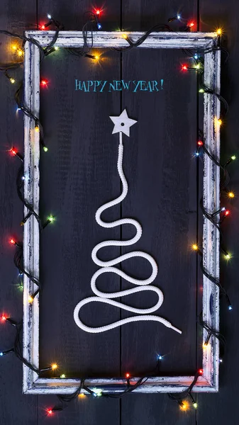 Символ рождественской елки на деревянном фоне. Копия пространства. Идея счастливого нового года. Рождество . — стоковое фото