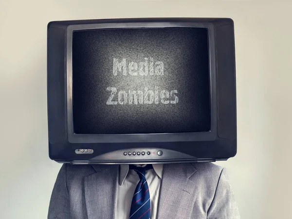 Un homme avec une télé au lieu d'une tête. Médias Zombie inscription . — Photo