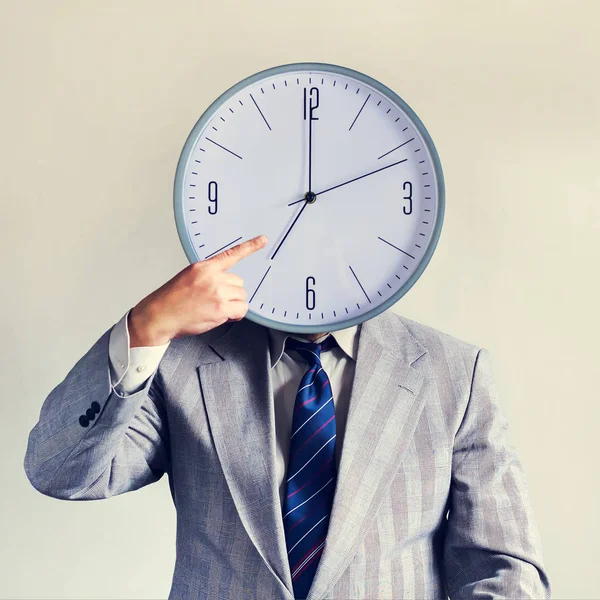 Businessman with a clock instead of a head. Concept business and efficiency. Time and schedule. Money and time. — Stock Photo, Image