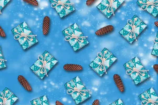 New Years gifts and cones on a blue background. . New Year. Christmas background.