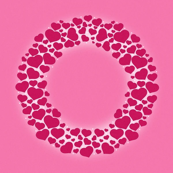 Pink hearts in the shape of a circle on a pink background. Copy space. Valentines Day, Mothers Day background.