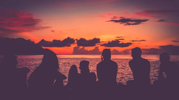 Travelers on Pier, Sunset, Kri Island. Raja Ampat — Stock Photo, Image