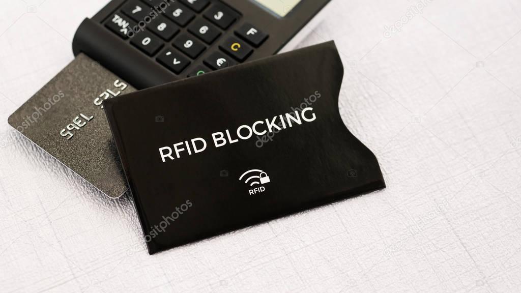 RFID protection sleeve for secure credit card from wireless stealing money, TAN generator with card on middle ground