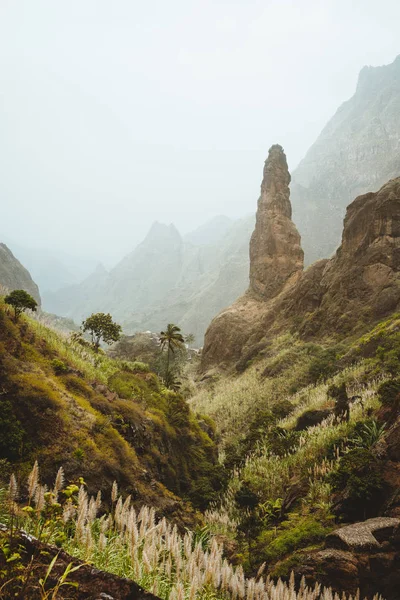 Santo Antao. Cape verde. Xo-Xo valley with amazin mountain peaks. Many cultivated plants growing in the valley between high rocks. Arid and erosion ground covered by dust air — Stock Photo, Image