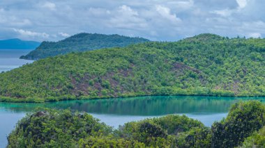 Bay between Islands in Peanemo, Raja Ampat, West Papua, Indonesia