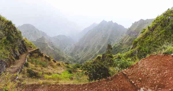 Panoramic view of the fertile ravine valley with volcanic mountain Ridges on Santa Antao island in Cape Verde — стоковое фото