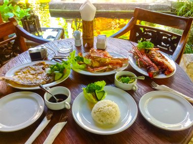 Bali dili Jimbaran plaj için mükemmel deniz food restoranlar ünlü