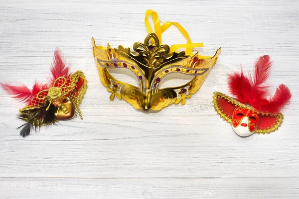 Venice masks on wooden background — Stock Photo, Image