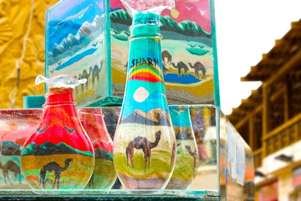 Sharm El Sheikh, Egypt - April 13, 2017: Decorative Glass Bottles with Colored Sand Inside — Stock Photo, Image