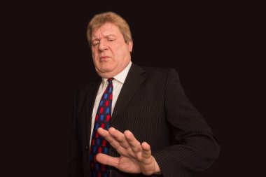 Dur jest gösterilen ciddi üst düzey iş adamı