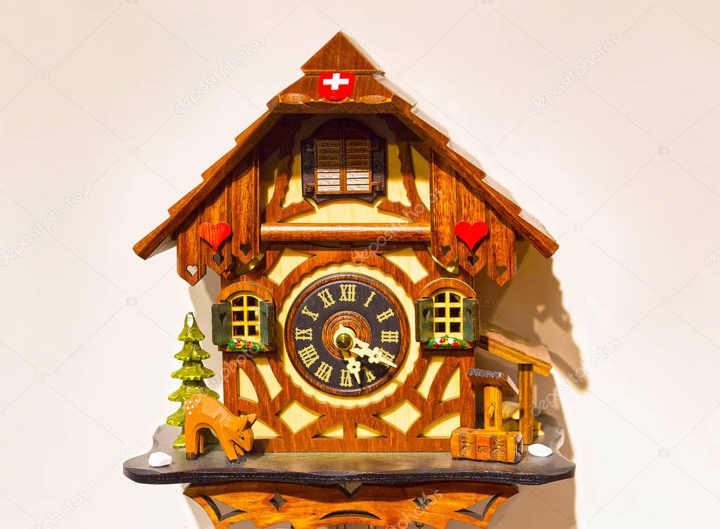 The detail of swiss wooden cuckoo clock
