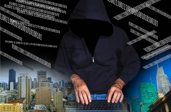 Hacker met laptop — Stockfoto