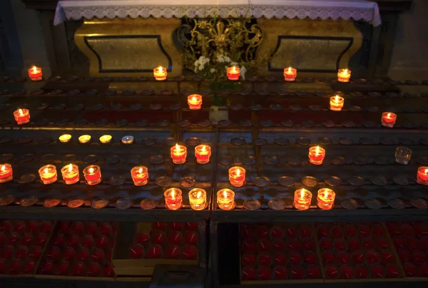 Church candles in abstract church — Stock Photo, Image