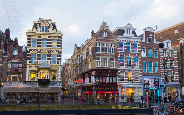 Amsterdam, Netherlands - December 14, 2017: The buildings of Amsterdam city