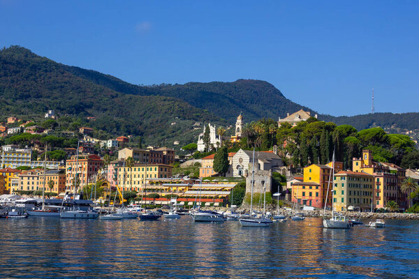 Santa Margherita Ligure, Liguria Italia - watching the coast from the sea. beautiful houses and villas with the typical architecture of the houses just behind the beaches