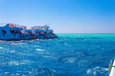 Sharm El Sheikh, Egypt - February 16, 2020: Sail boat ship with tourists in Ras Mohamed National Park in the Red Sea, Sharm El Sheikh, Egypt