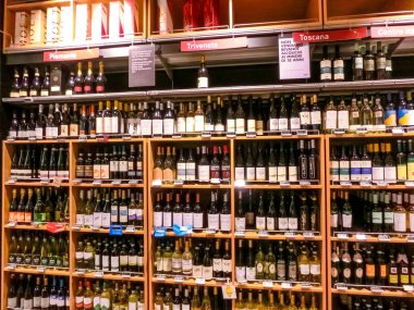 Genoa, Liguria, Italy - September 11, 2019: The wine shellves at supermarket COOP at Genova, Italy