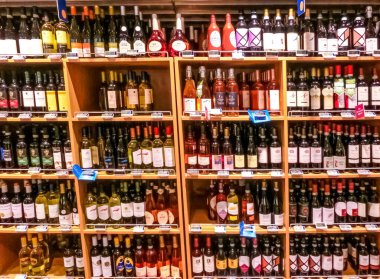 Genoa, Liguria, Italy - September 11, 2019: The wine shellves at supermarket COOP at Genova, Italy