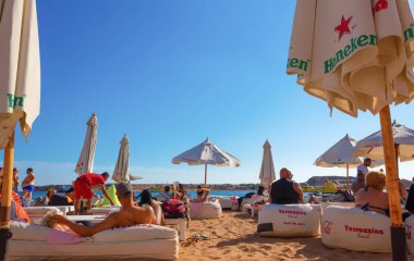 Sharm El Sheikh, Egypt - February 18, 2020: People resting at Terrazzina beach in Egypt