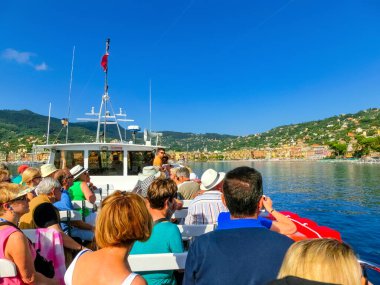 Santa Margherita Ligure, Italy - September 17, 2019: The people at boat tour and view from ship of town Rapallo in Liguria, Italy.