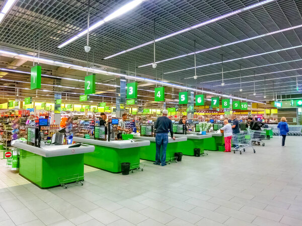 Kyiv, Ukraine - September 4, 2019: Row of cashier and cash desk in a supermarket Novus at Kyiv, Ukraine on September 4, 2019