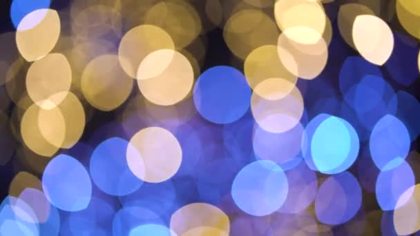 Bewegende blauwe en gouden bokeh lichte achtergrond — Stockvideo