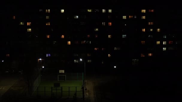 Time lapse switching lights in multistory building at night — Stock Video