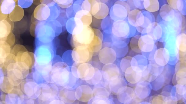 Bokeh background with stirring blue and yellow lights — Stock Video