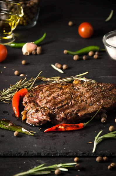 Rare steak black square plate slate — Stock Photo, Image