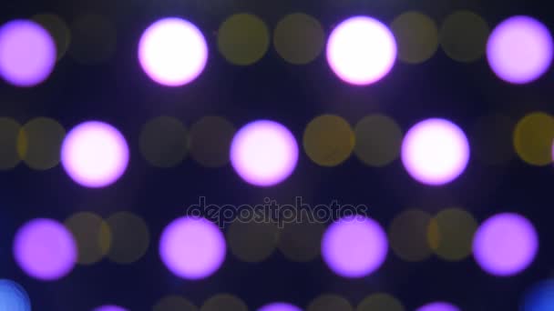 Blurry focus of colorful ray light in the background of stage — Stock Video