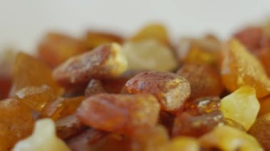 Amber taş makro döndürmek