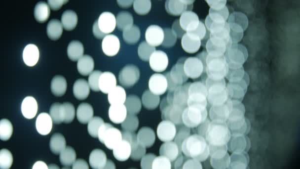 Moving particles, blurred, bokeh lights background. Abstract sparkles. — Stock Video