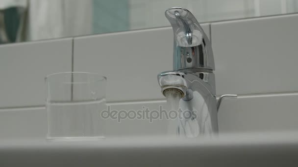 Water running continuously from water tap. — Stock Video