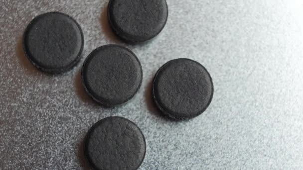 Closed up Activated charcoal carbon pills — Stock Video