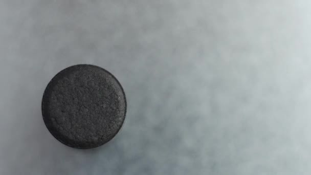 Closed up Activated charcoal carbon pills — Stock Video