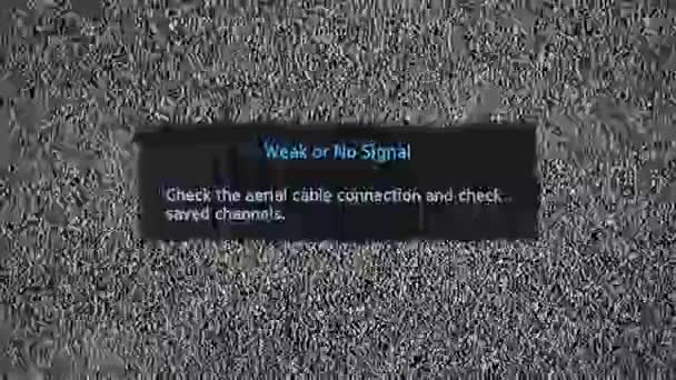 Weak or No Signal inscription on television screen with noise — Stock Video