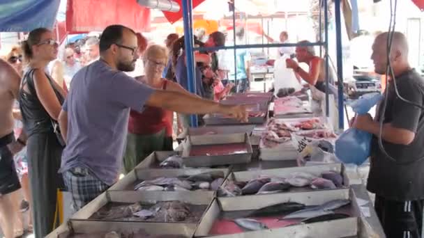 Marsaxlokk Village, Malta, July 6, 2016. Fresh Fish Market in the village, with tourists — Stock Video