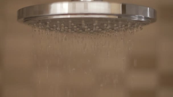 Shower flowing in close-up and slow motion — Stock Video