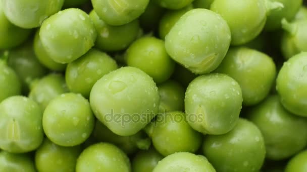Green peas rotate, top view. — Stock Video